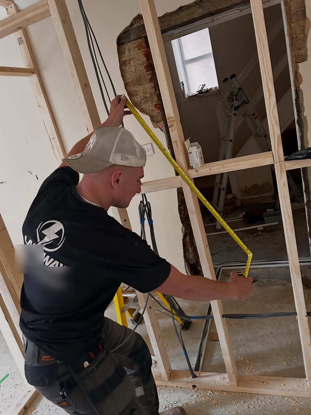 Louis on the tools during first fix